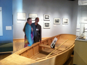 Gary and Karen Davis with pole skiff Gary built - Workboats of Core Sound exhibit